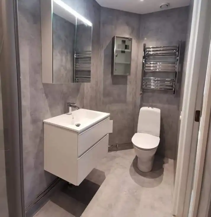 Microcemento en baño, acabado continuo sin juntas instalado en Hidalgo